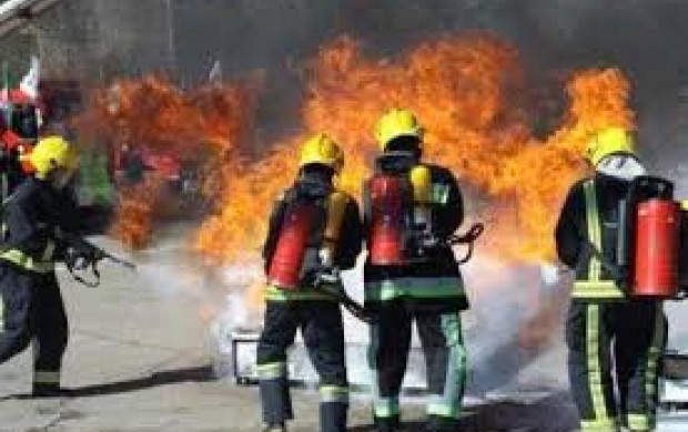 آتش سوزی در یک کارگاه خیاطی در تهران