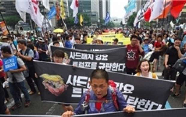 هزاران معترض کره ای:موشک تاد خیر،ترامپ خیر
