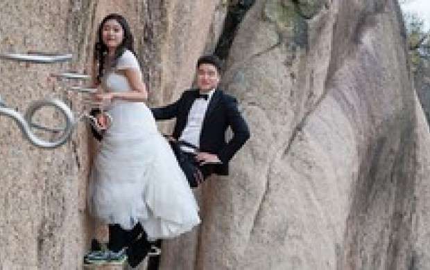 عروسی"اسپایدرمن های چینی"روی دیوار!+عکس