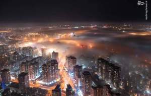عکس/ ساختمان‌های چین در محاصره مه