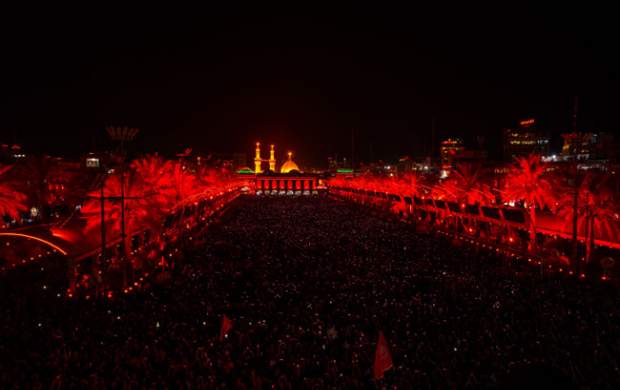مراسم تعویض پرچم گنبد حرم امام حسین(ع)
