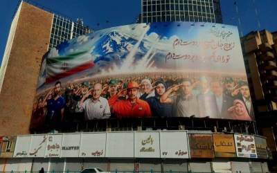 «منم سرباز ایران» به دیوارنگاره میدان ولیعصر رسید