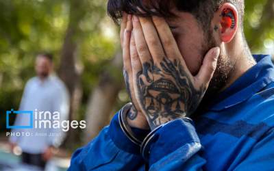 عکس/ خالکوبی عجیب داخل گوش یک سارق