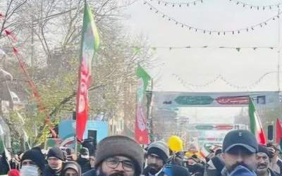 عکس/ پدر و پسر شهید در راهپیمایی ۲۲ بهمن